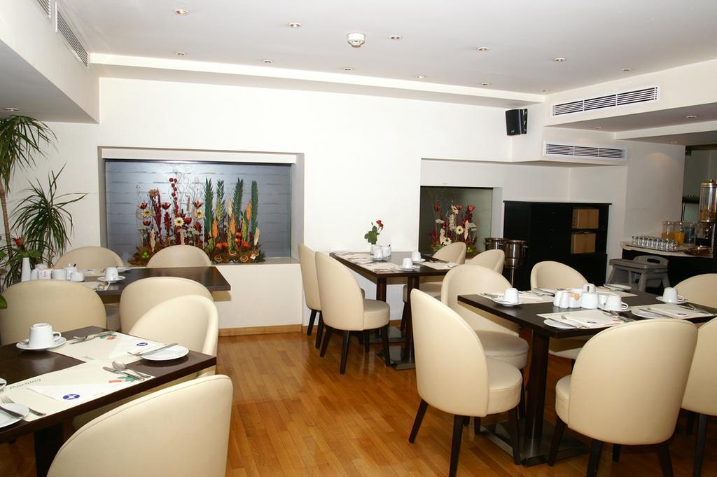 Hotel Lozenge Atenas Restaurante foto